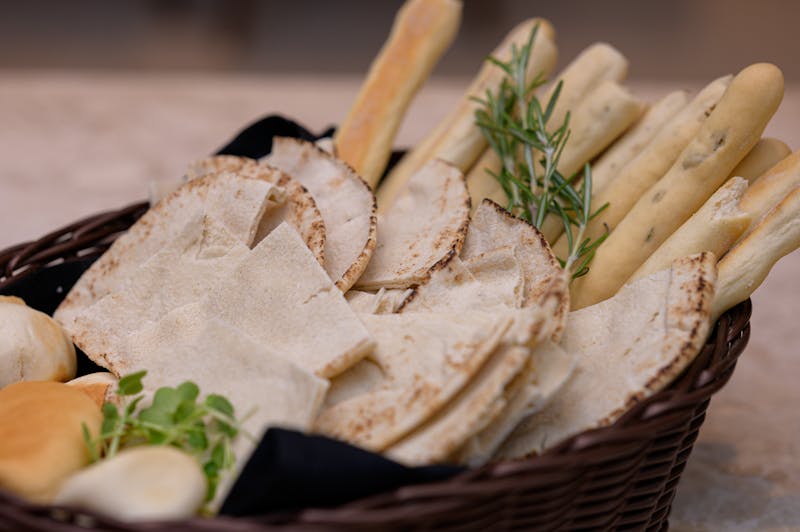 Garlic bread sticks with herbs and dipping sauce